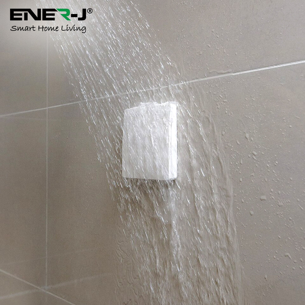 White Wireless Kinetic Switch on a tiled floor with Ener-J branding.