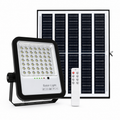 Solar light system with solar panel, light fixture, and remote control on a white background