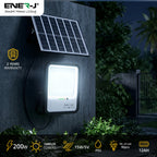 Solar light fixture on a wall with Ener-J branding, showing 2-year warranty and specifications.